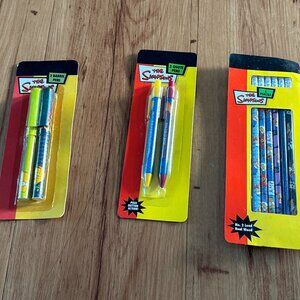 The Simpsons Plastic Barrel pen, Plastic Click pens, and Number Two pencil set